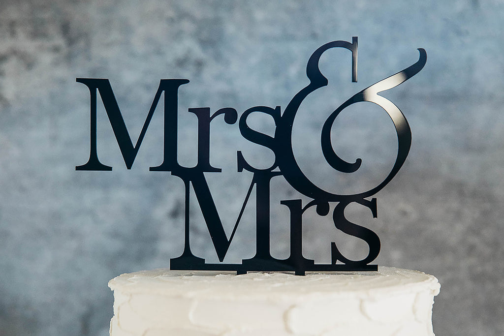 Lesbian Mrs & Mrs Black Wedding Cake Topper On Top of White Cake - Close Up