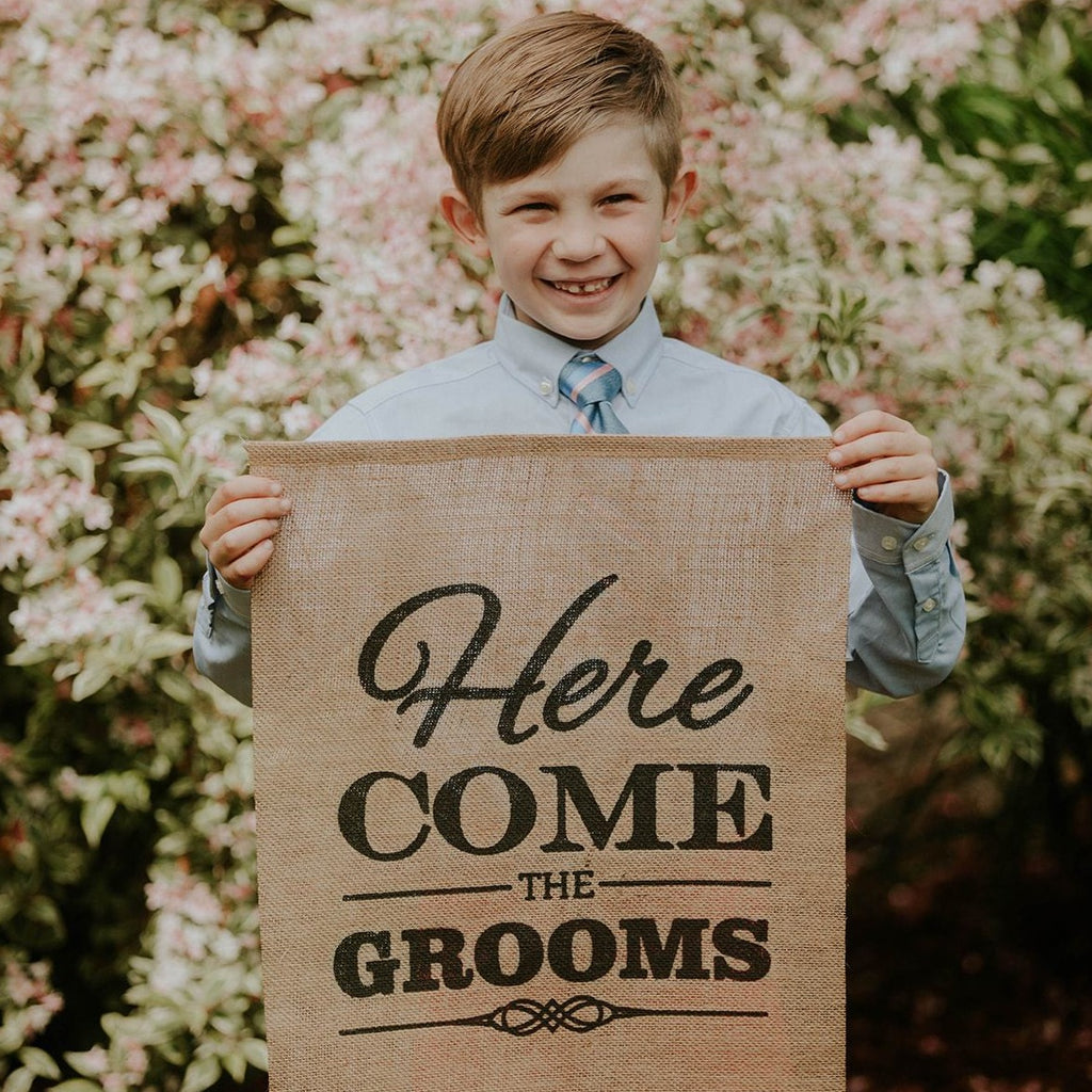 Child Holding Here Come The Grooms Brown Burlap Banner - LGBTQ Wedding Day
