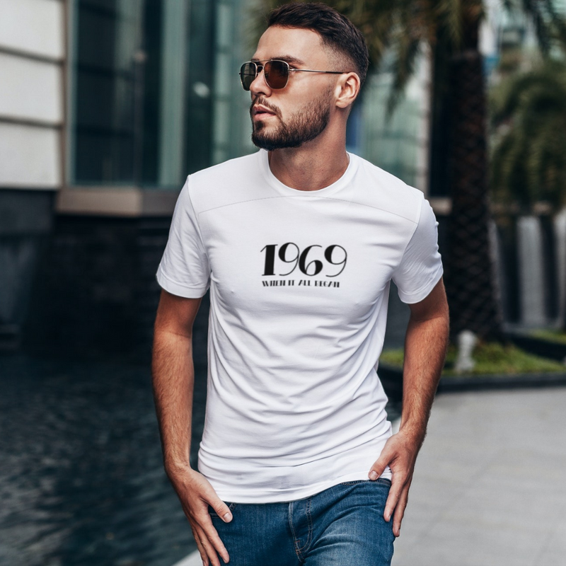 LGBTQ+ Pride Shirt - 1969 Where It All Began - Person with beard, sunglasses and jeans 