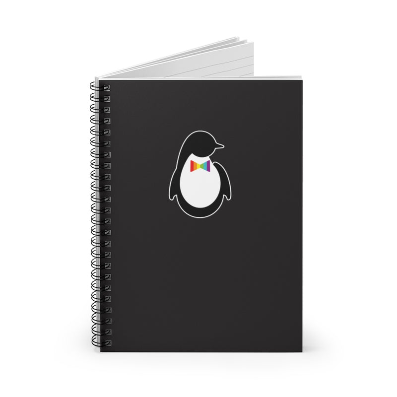 Black Spiral Bound Notebook with Dash of Pride Penguin Logo - Propped on Edge and Open - Lined Paper