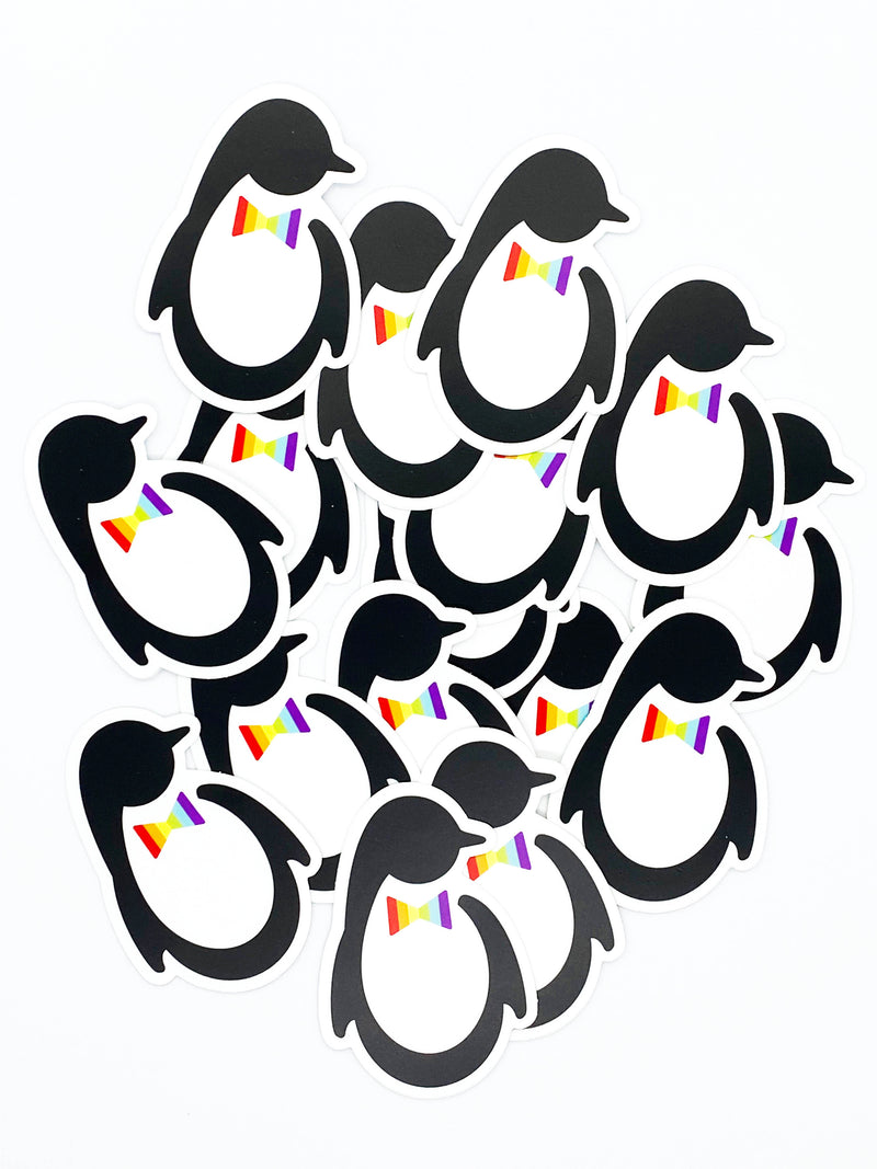 Pile of Dash of Pride Penguin Logo Stickers