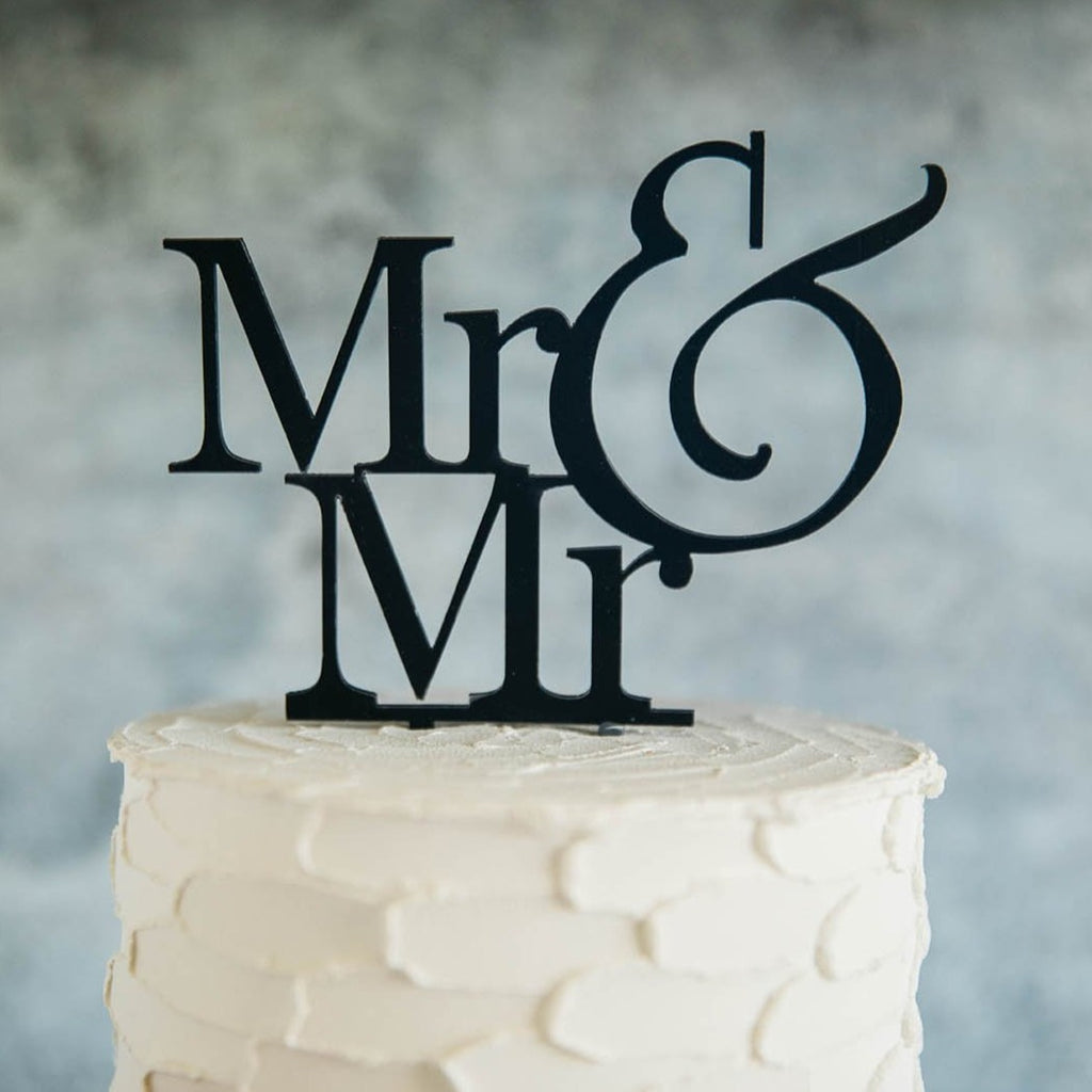 Gay Men's Mr & Mr Black Wedding Cake Topper On Top of White Cake - Close Up