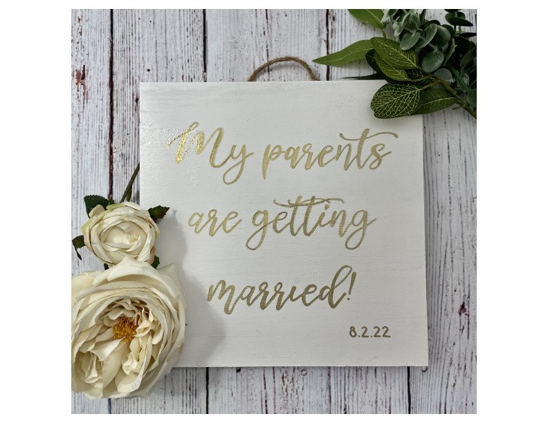 LGBTQ+ Wooden sign with gold lettering - My parents are getting married