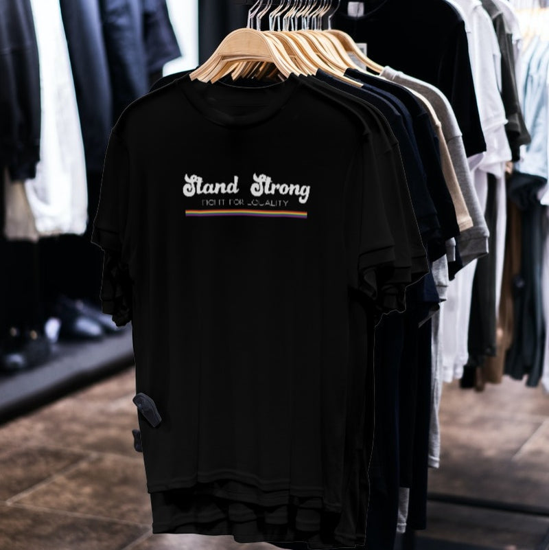LGBTQ+ Pride Shirt - Stand Strong  - Black shirts on hanger